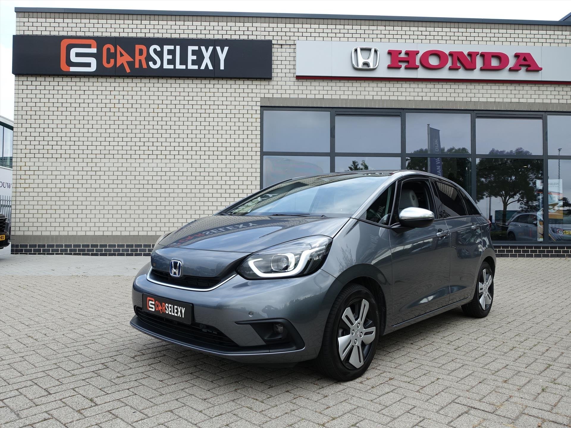 HONDA Jazz 1.5 i-MMD 109pk Hybrid CVT Executive Nieuwstaat 1, Auto's, Automaat, Stof, Euro 6, 98 pk
