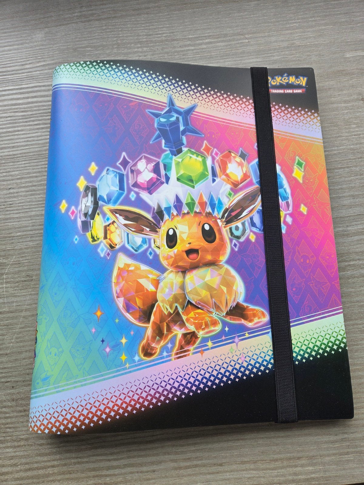 Pokémon binder prismatic evolution, Ophalen of Verzenden, Zo goed als nieuw, Overige typen