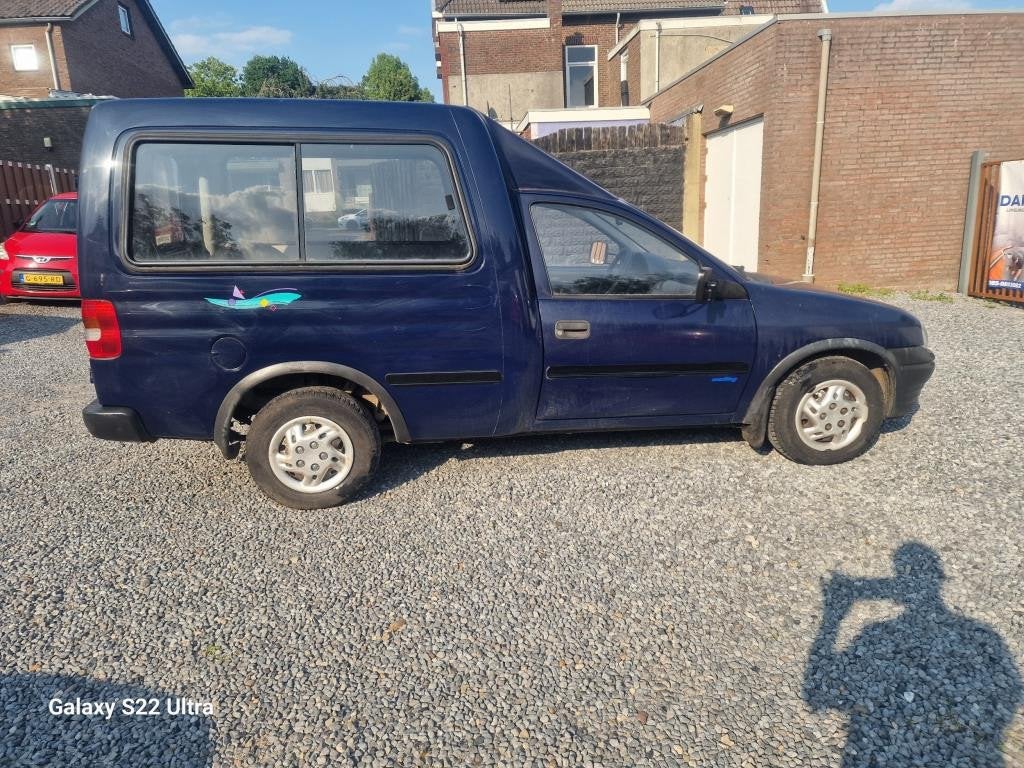 Opel Combo 1.4 Tour, Auto's, Opel, Gebruikt, 4 cilinders, 1055 kg, Origineel Nederlands