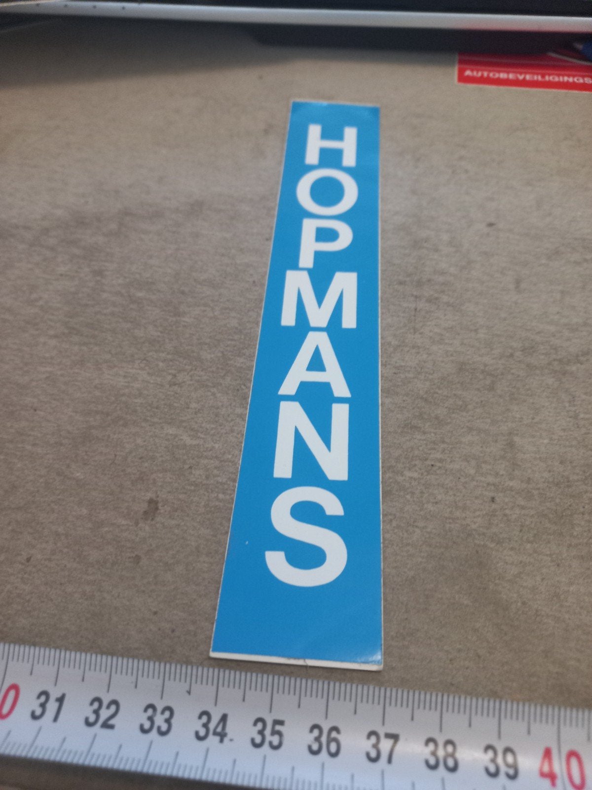 Vintage 'HOPMANS' sticker - Blauw met witte letters, Ophalen of Verzenden