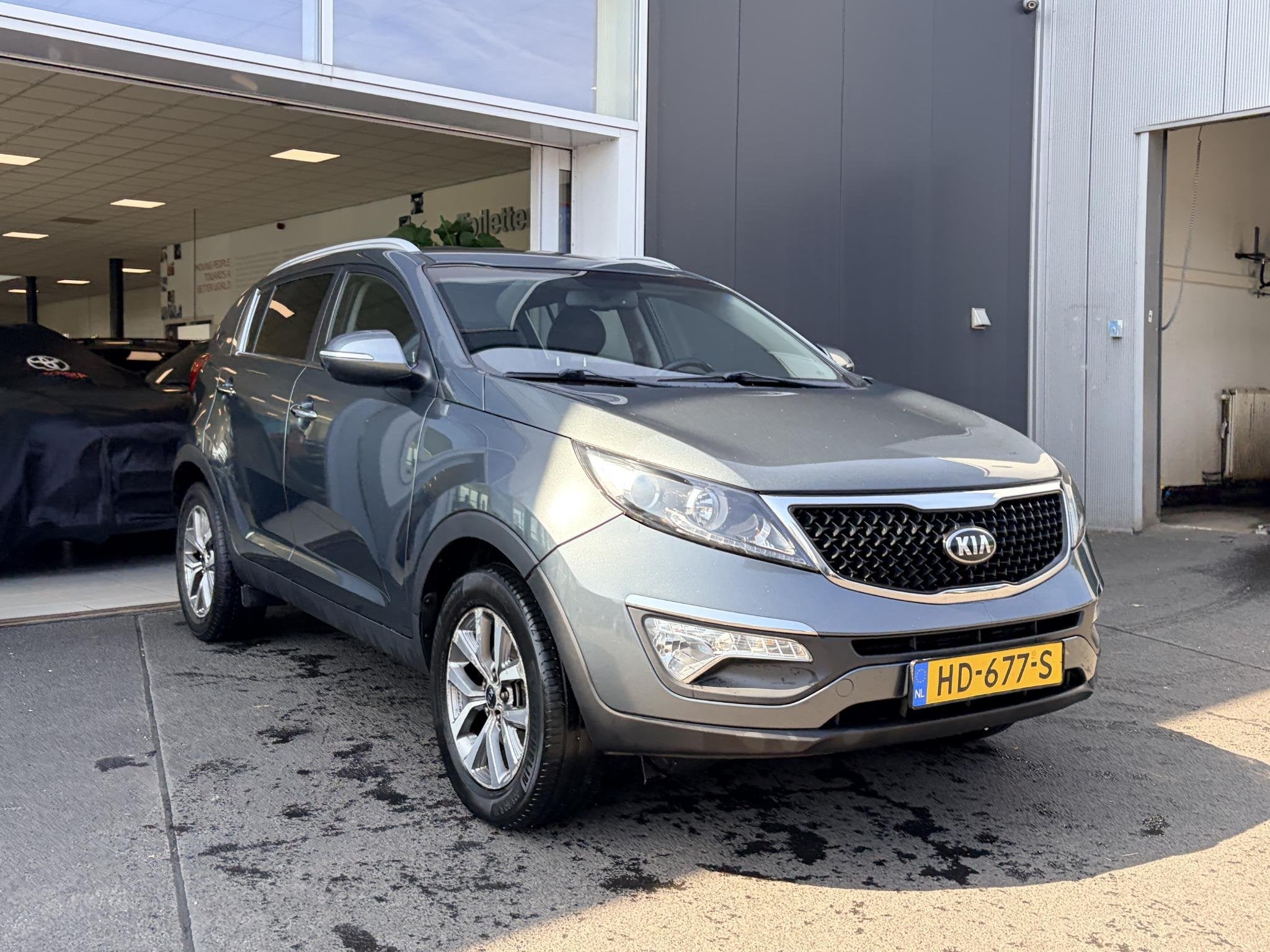 Kia Sportage 2.0 X Line 4WD | Bluetooth | Achteruitrijcamera, Auto's, Automaat, Gebruikt, 4 cilinders, Leder