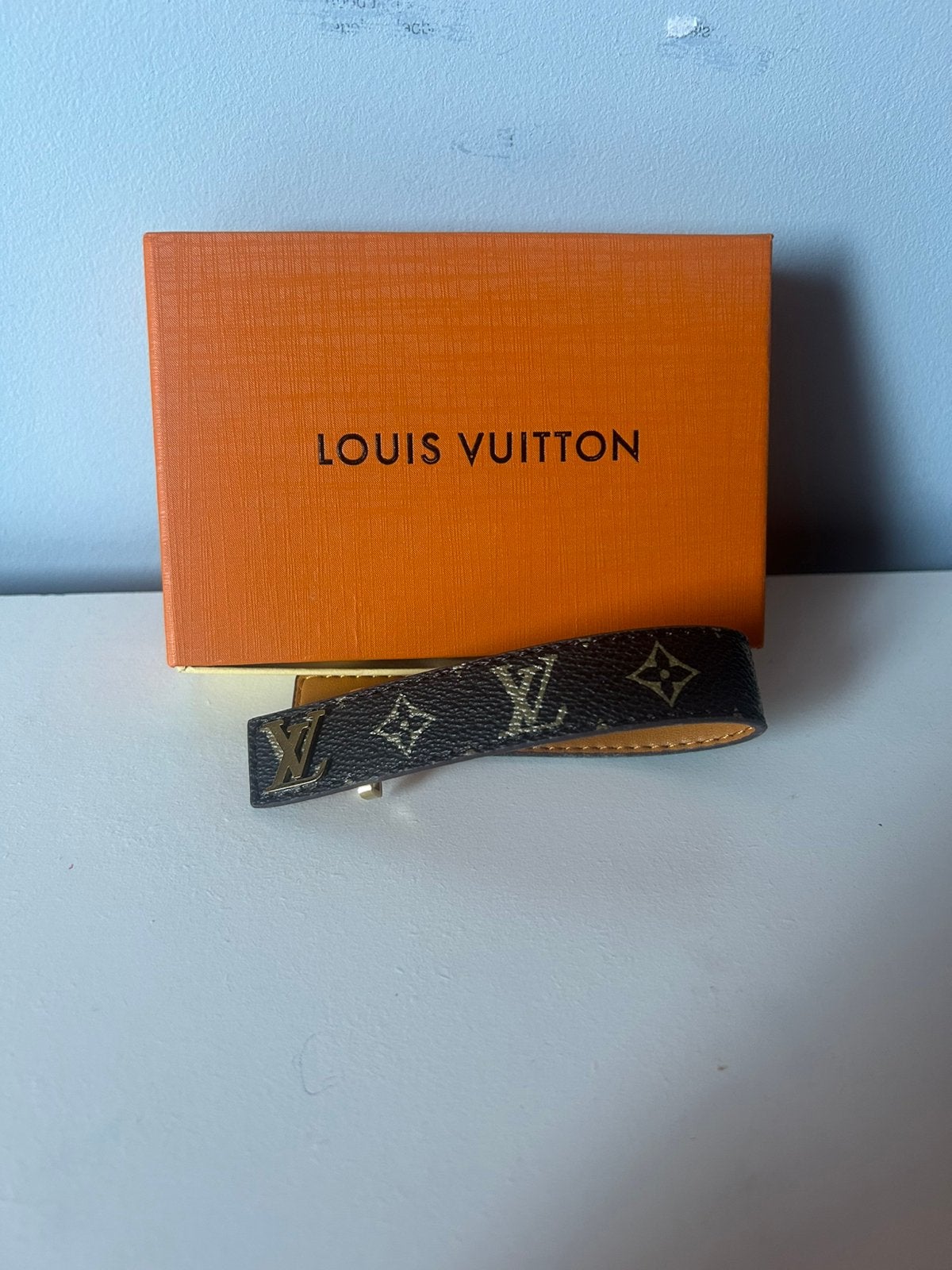 Louis Vuitton armband slim, Ophalen of Verzenden, Zo goed als nieuw, Bruin, Leer