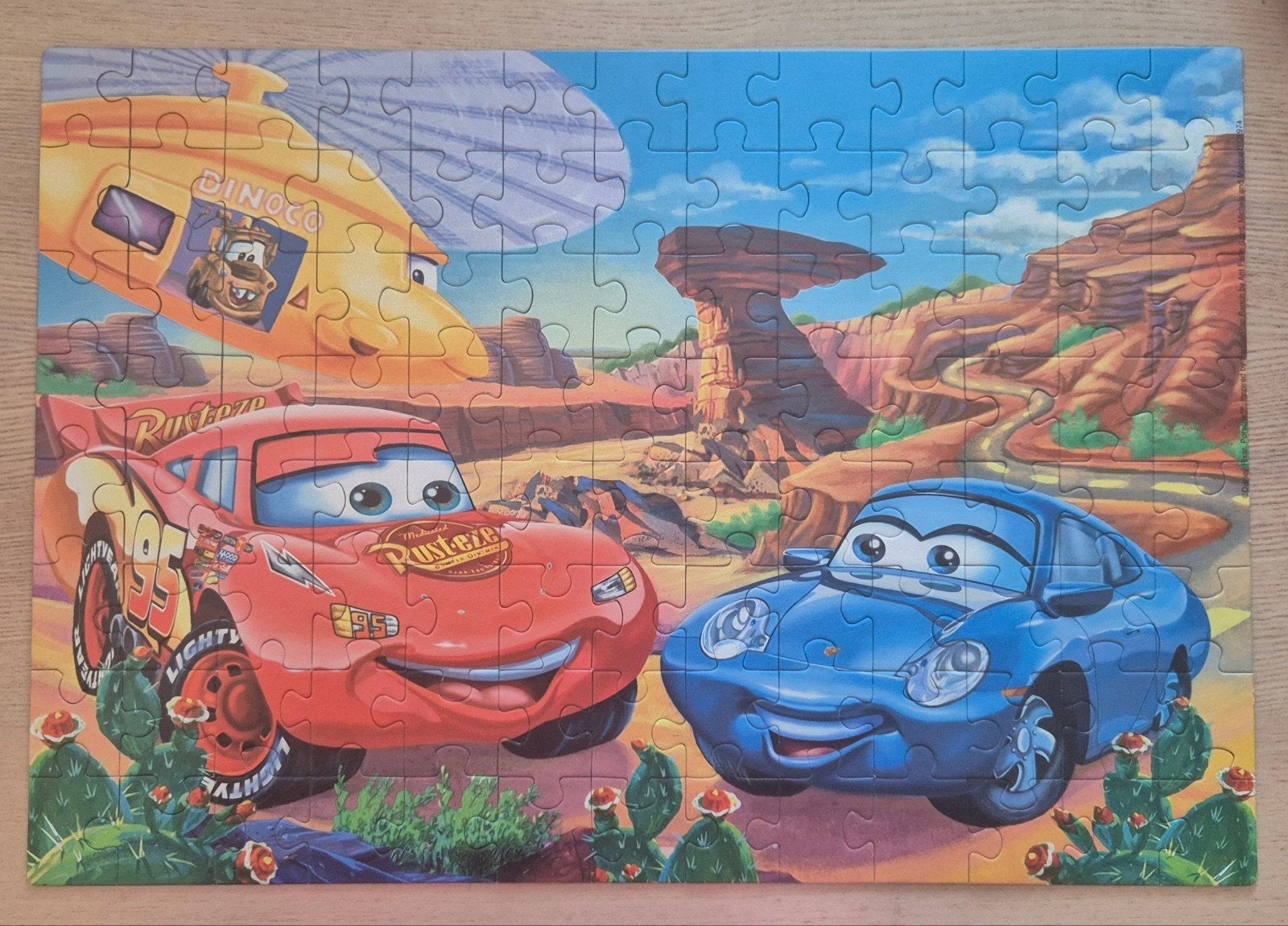 puzzel cars 104 redelijk grote stukjes kompleet, Ophalen of Verzenden