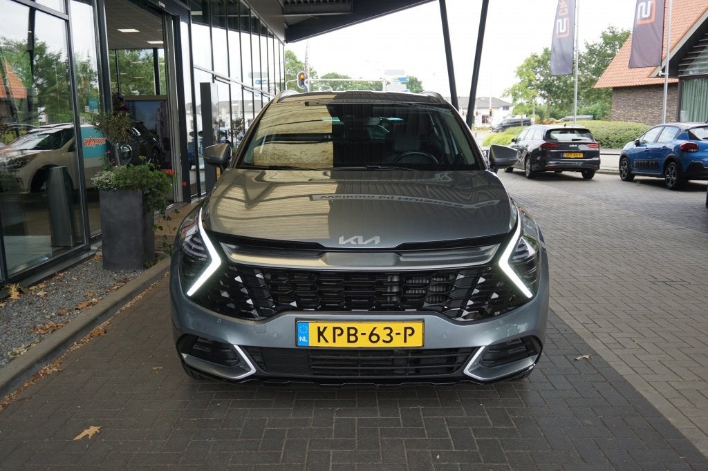 Kia Sportage 1.6 T PHEV DynamicLine AWD | SOH 100% | Stoel-/, Auto's, 14 kWh, Gebruikt, Leder en Stof, Bedrijf