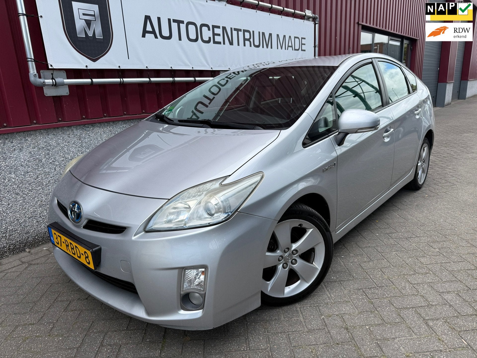 Toyota Prius 1.8 Comfort // Automaat // Navi // Clima, Stof, Gebruikt, Zwart, 4 cilinders