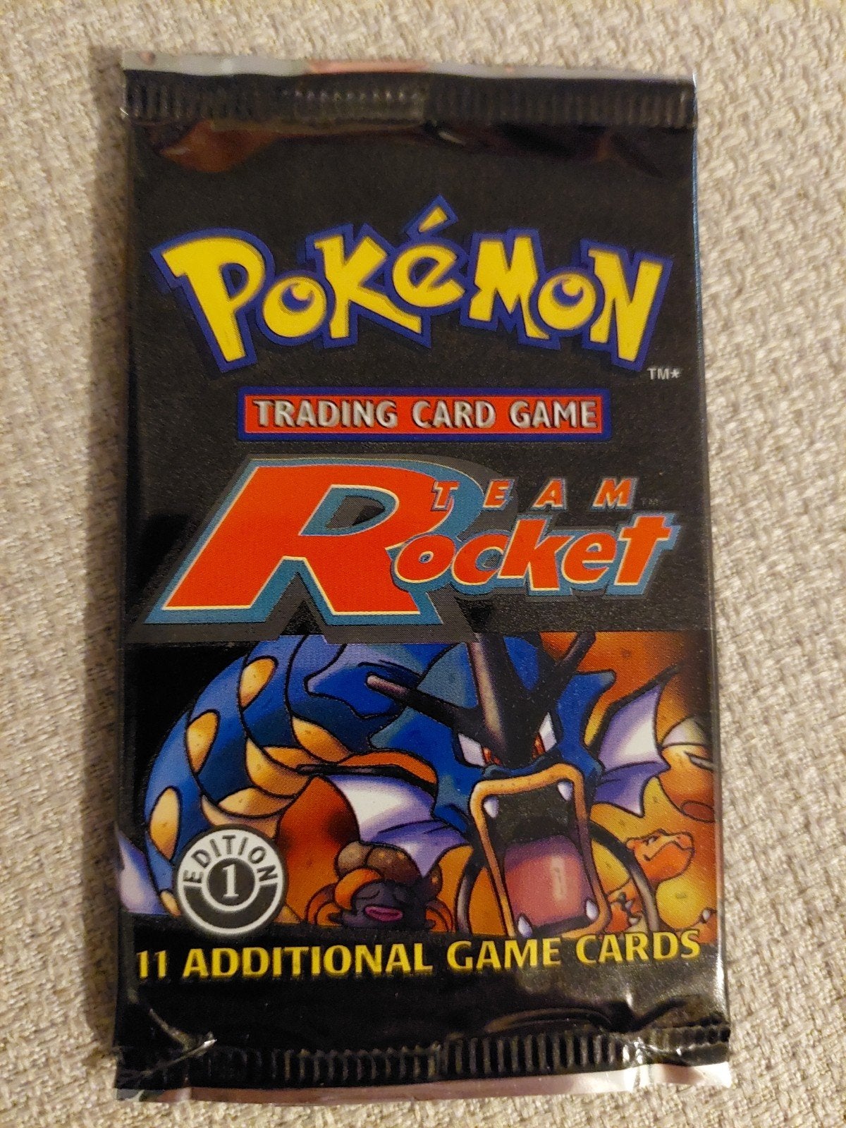 Pokémon Team Rocket Booster Pack 1st Edition Gyarados, Ophalen of Verzenden, Nieuw, Booster