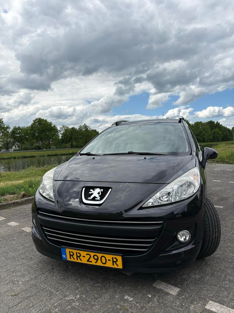 Peugeot 207 1.6 SW Outdoor 2011 Zwart, Auto's, Peugeot, Voorwielaandrijving, Stof, 4 cilinders, Sound system