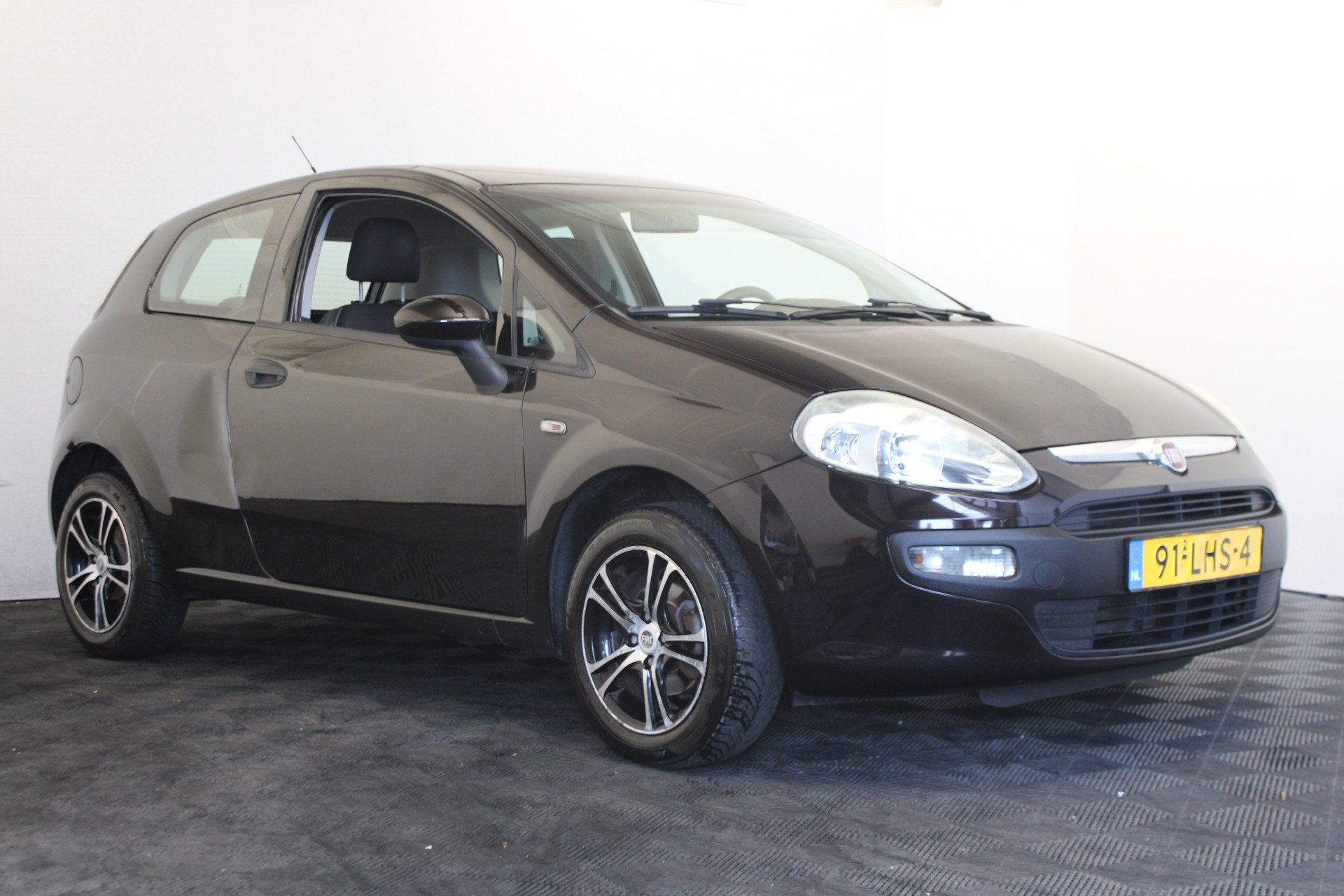 Fiat Punto Evo 1.2 Active (bj 2010), Auto's, Fiat, Voorwielaandrijving, Stof, 4 cilinders, Zwart