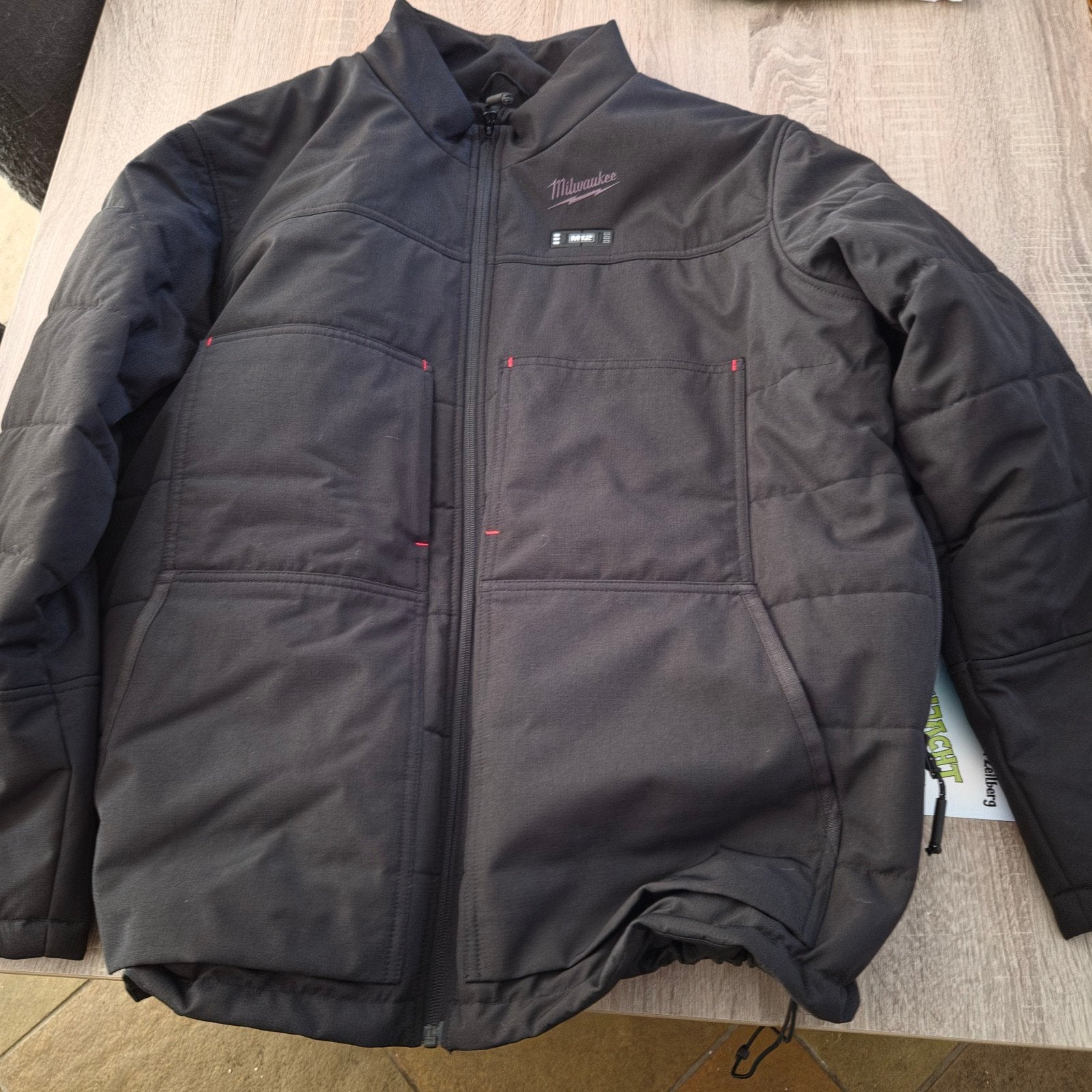 Milwaukee verwarmde jas 2XL met M12 BC accu, Zwart, Nieuw, Overige maten, Ophalen of Verzenden