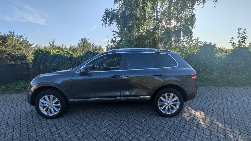 VW Touareg 3.0 V6 TDI | Luchtvering | Pano | Leder | Xenon, Auto's, Volkswagen, Euro 5, Zwart, 255 €/maand, Diesel