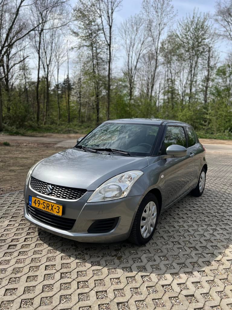 Suzuki Swift 1.2 3-D 2011 Grijs NAP, Auto's, Suzuki, Voorwielaandrijving, Stof, Swift, Origineel Nederlands