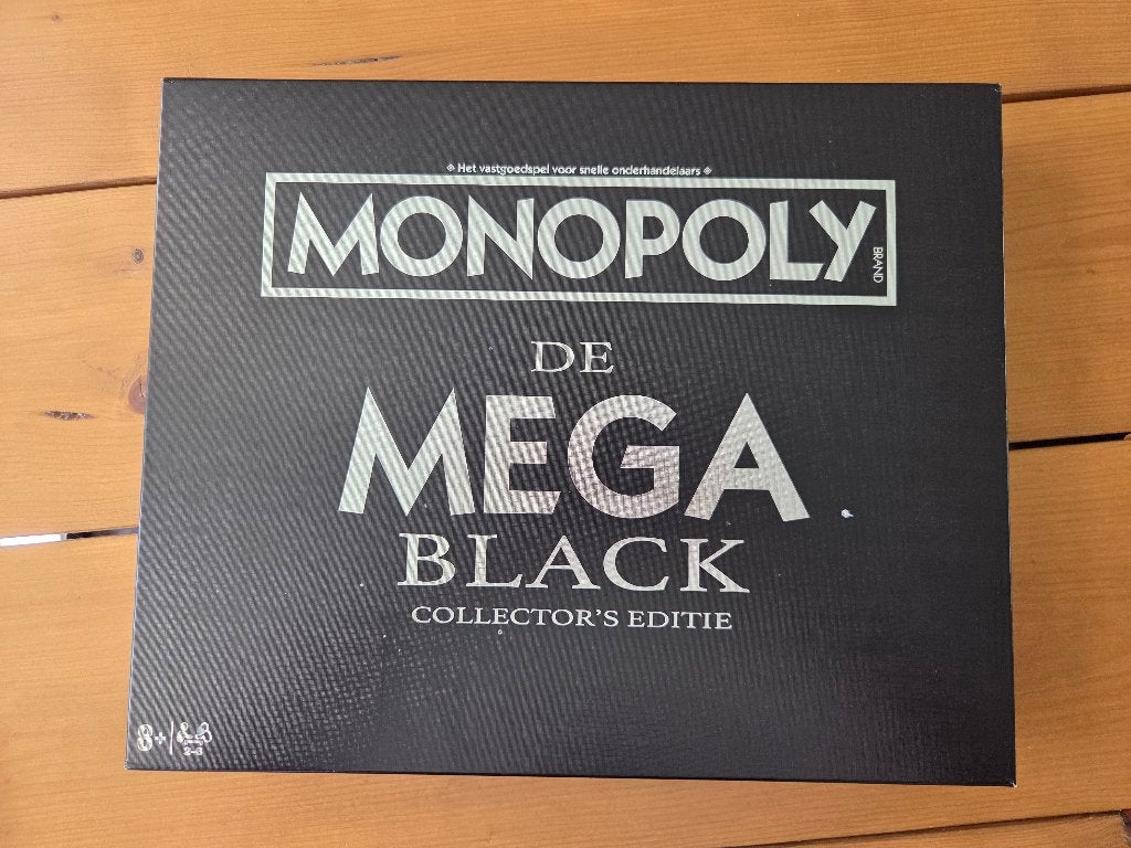 Monopoly De Mega Black Collector's Editie – Hasbro, Hobby en Vrije tijd, Een of twee spelers, Ophalen of Verzenden, Zo goed als nieuw