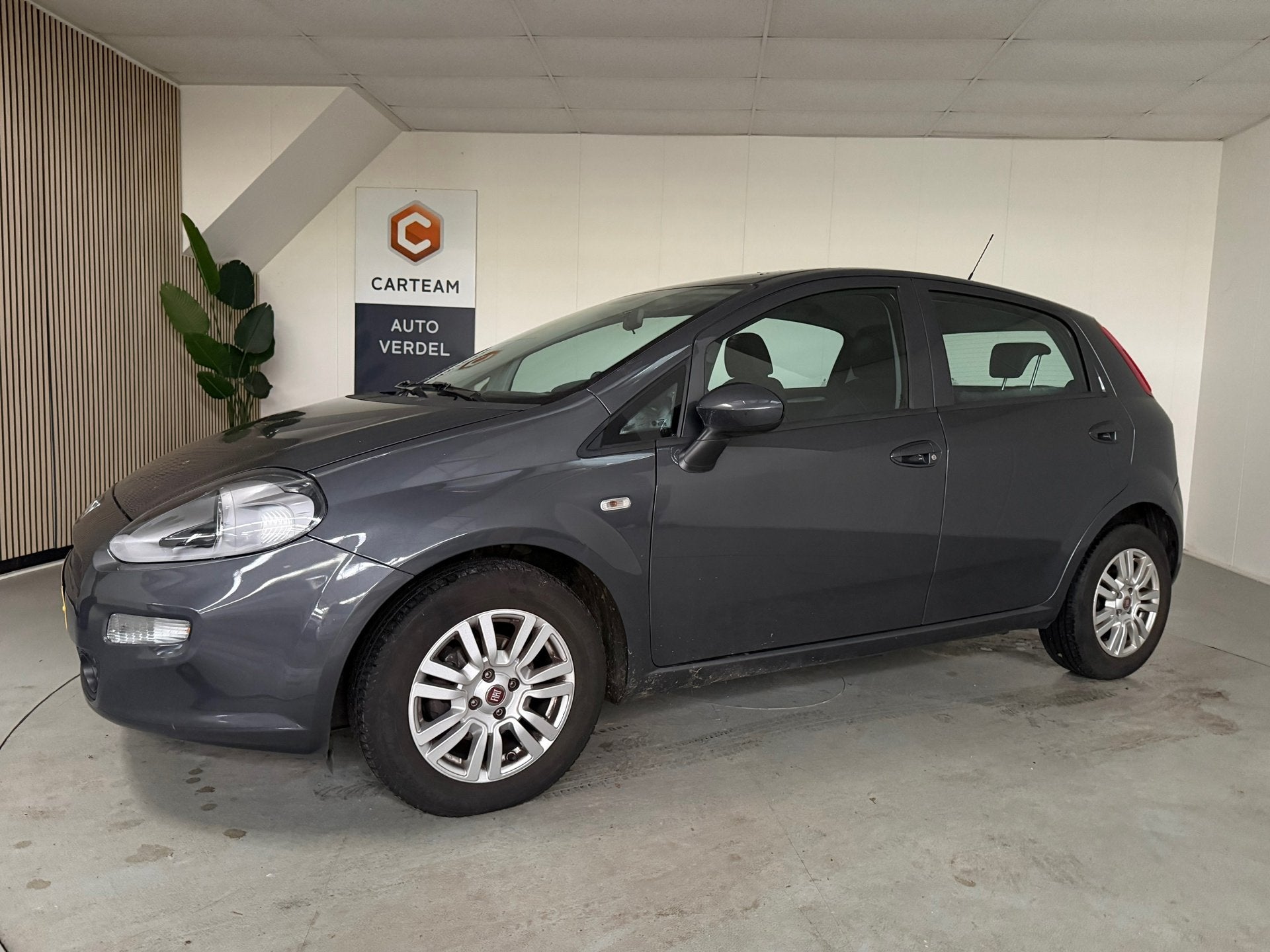 Fiat Punto Evo 0.9 TwinAir Lounge Airco, Navigatie, LMV, Voorwielaandrijving, Gebruikt, Euro 6, 100 pk
