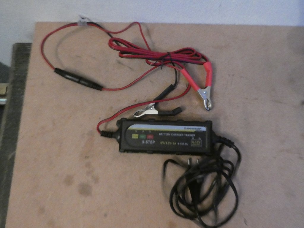 Dunlopp batterij/ acculaderlader, Gebruikt