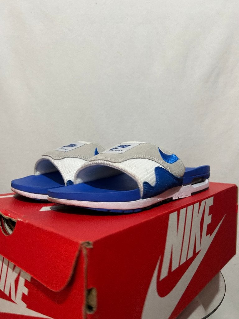 ALS NIEUW + DOOS! Maat 44 - Nike Air Max 1 Slide Royal Blue, Slippers, Nike, Zo goed als nieuw, Nike