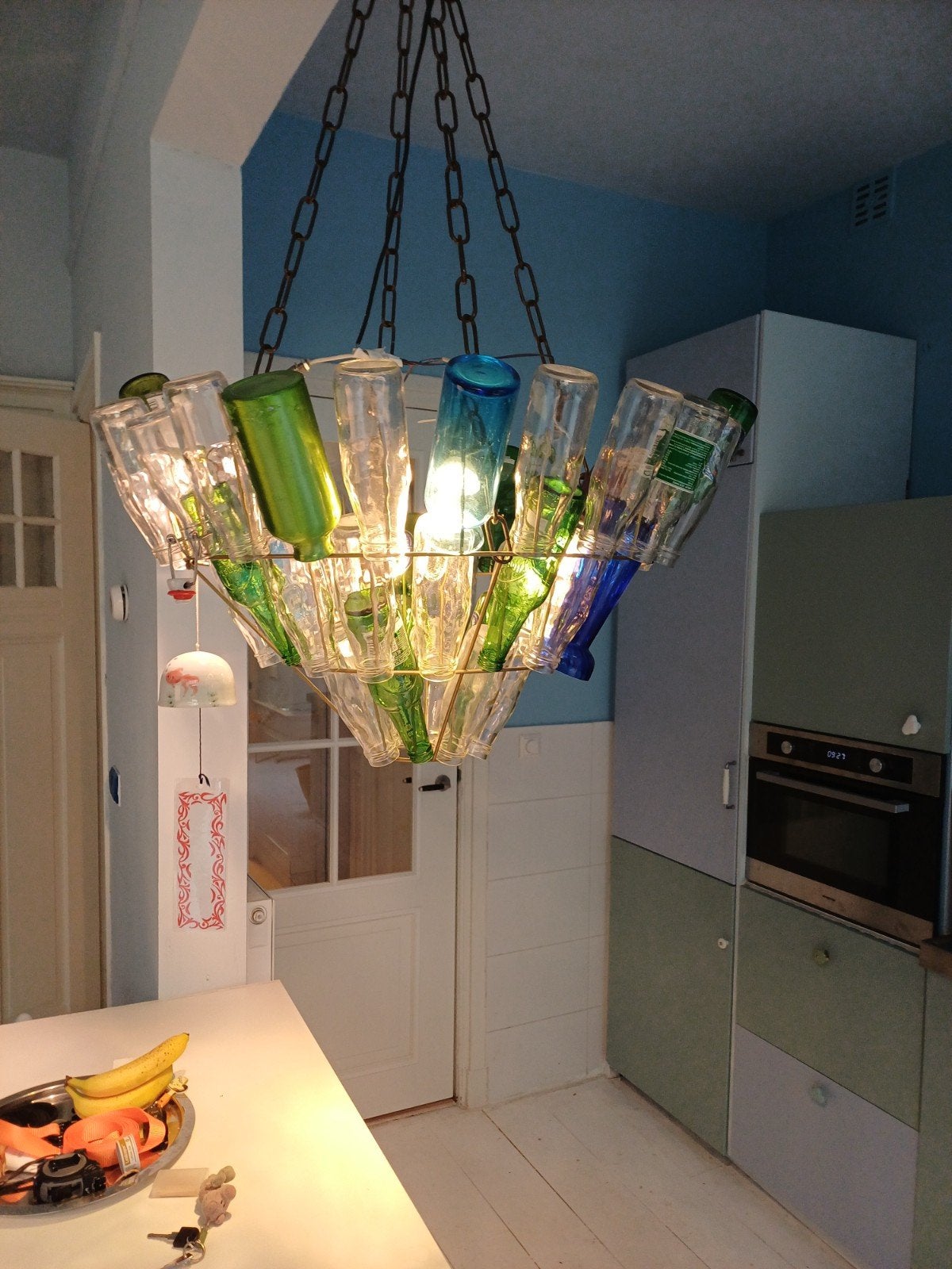 Flessenlamp design kroonluchter, Ophalen