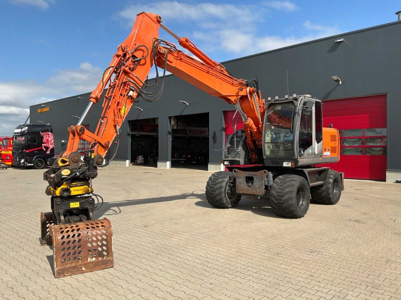 2009 hitachi ZX140W-3 Banden graafmachine, Zakelijke goederen, Machines en Bouw | Kranen en Graafmachines, Graafmachine