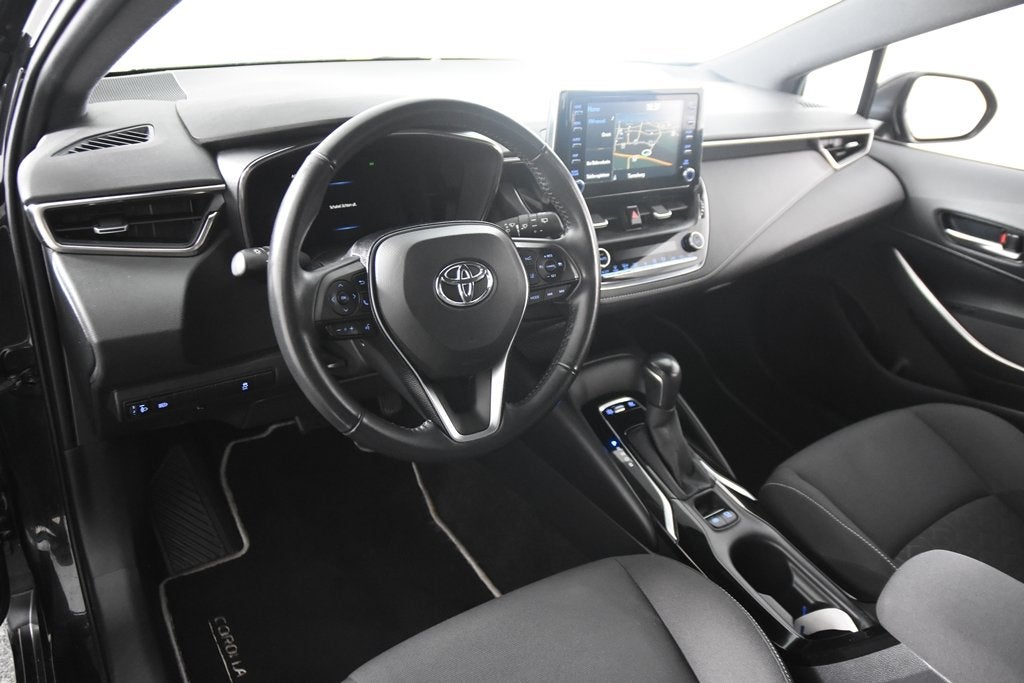 Toyota Corolla 1.8 Hybrid *1ste eigenaar*Navigatie*Park Assi, Auto's, Toyota, Stof, Gebruikt, 4 cilinders, Corolla