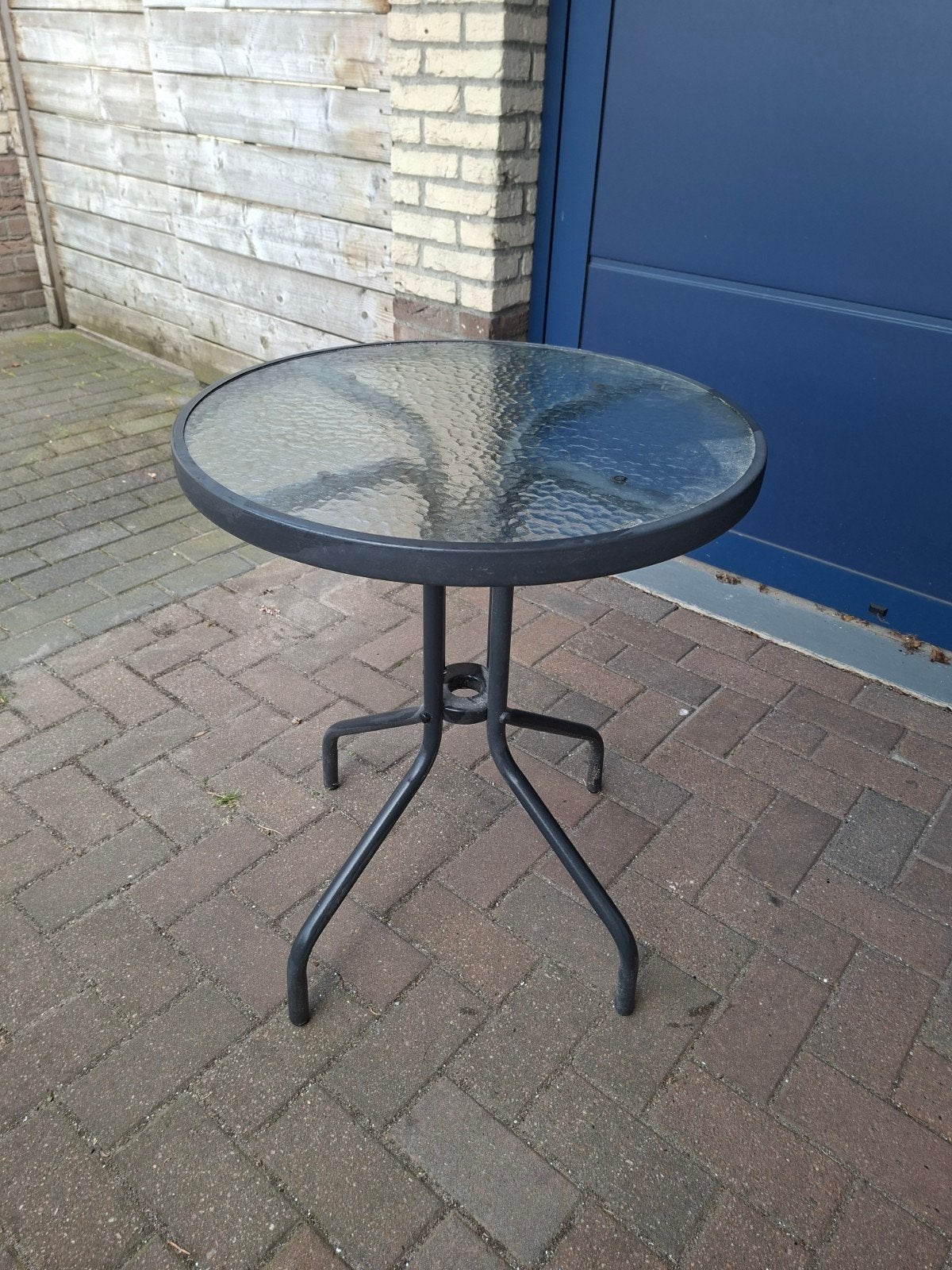 Glazen terrastafel in goede staat, Tuin en Terras, Tuintafels, Ophalen, Zo goed als nieuw, Rond, Metaal