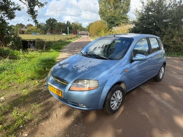 Chevrolet Kalos 1.4 16V 5D 2005 Blauw, Auto's, Voorwielaandrijving, 1005 kg, Stof, 40 €/maand