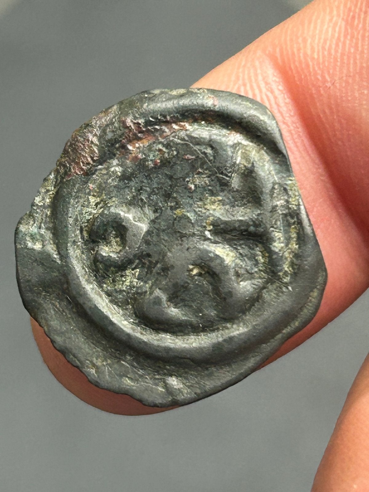 Potin van de REMI-stam. +/- 50 BC.Bodemvondst/metaaldetector