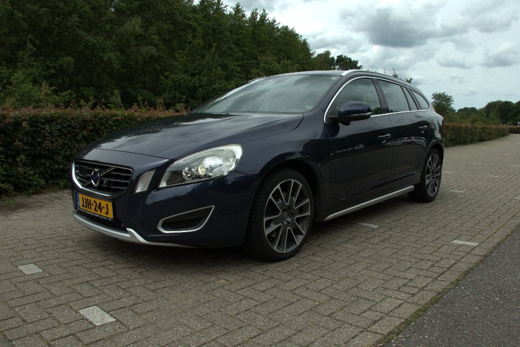 Volvo V60 D5 2.4 151KW AWD Aut6 2011 Blauw, Auto's, Volvo, Automaat, 1800 kg, Zwart, Blauw