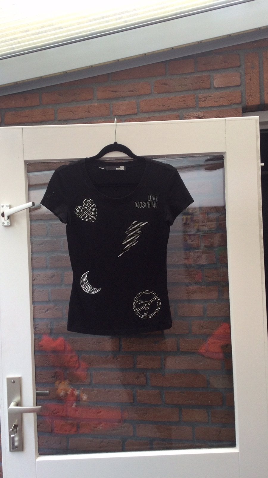 Love Moschino zwarte steentjes shirt maat i40, Ophalen of Verzenden, Zo goed als nieuw, Zwart, Korte mouw
