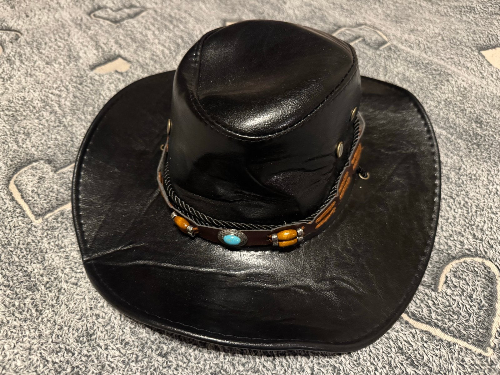 Zwarte cowboyhoed met turquoise en bruine details, Ophalen of Verzenden, Zo goed als nieuw, One size fits all, Hoed