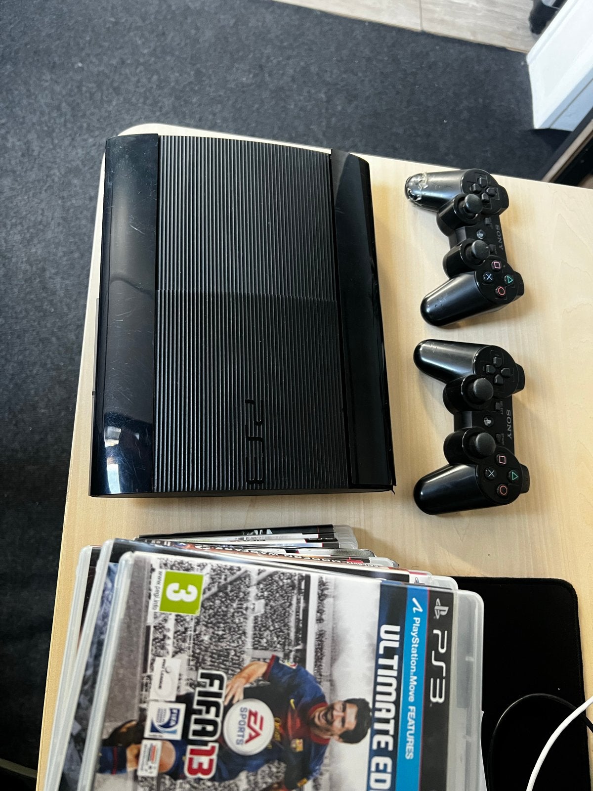 PS3 Super Slim 500GB met 2 controllers en 14 games, Super Slim, Met 2 controllers, Ophalen of Verzenden, 500 GB