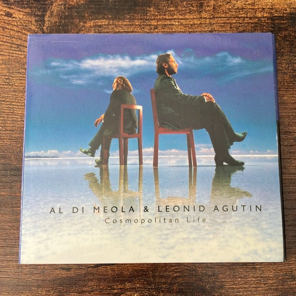 CD Al Di Meola & Leonid Agutin - Cosmopolitan Life, Gebruikt, Jazz-fusion, Inclusief boekje, Ophalen of Verzenden