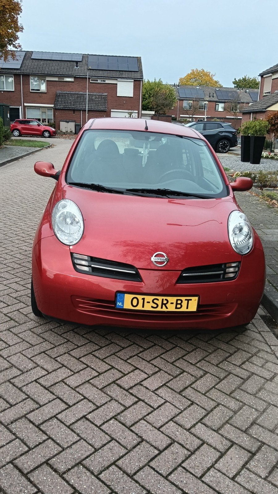 Nissan Micra  1.2 48KW, Lage km stand, 5DR 2005 Rood, Auto's, 31 €/maand, 4 cilinders, Micra, Handgeschakeld