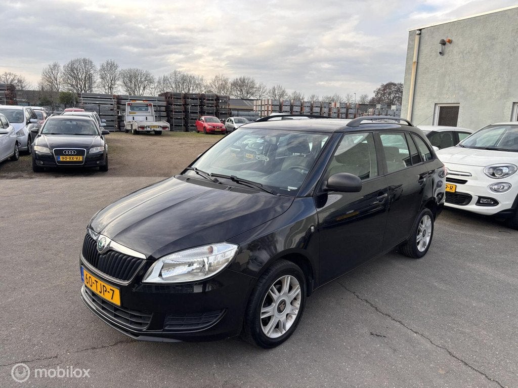 Skoda Fabia Combi 1.2 Active 2012, Auto's, Skoda, Voorwielaandrijving, Euro 5, 1198 cc, Zwart