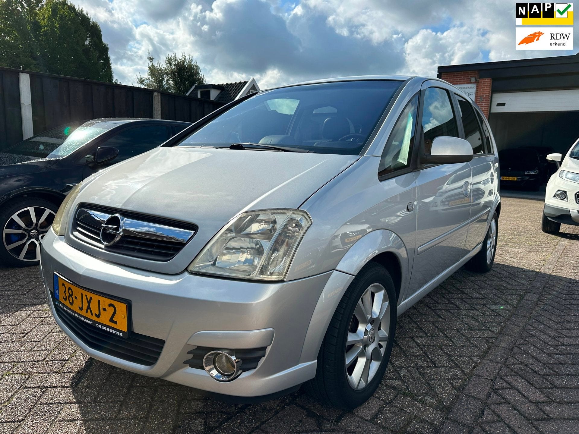 Opel Meriva 1.6-16V Cosmo CLIMA-CRUISE-PDC-CENTRAAL, Auto's, Voorwielaandrijving, Dealer onderhouden, 15 km/l, Zwart