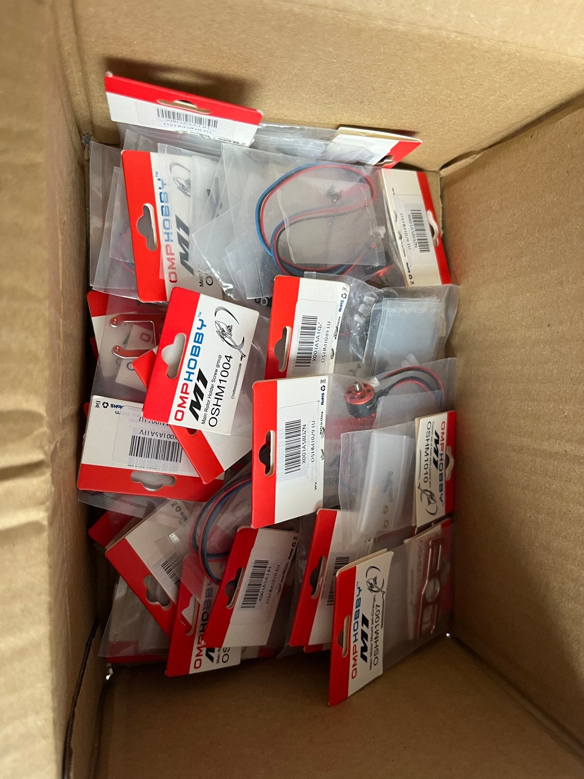 100x OMP Hobby M1 onderdelen - Nieuw in verpakking, Ophalen of Verzenden, Nieuw, Elektro, Helikopter