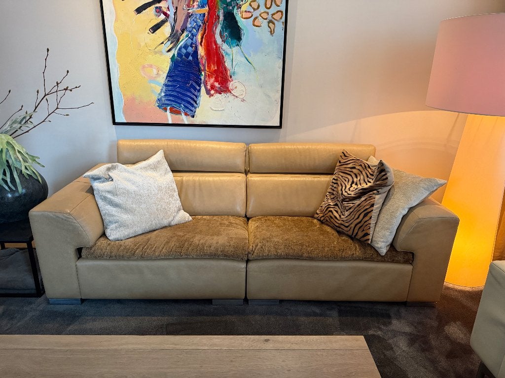 Leolux Howlazy designbank – leer & stof – opnieuw bekleed