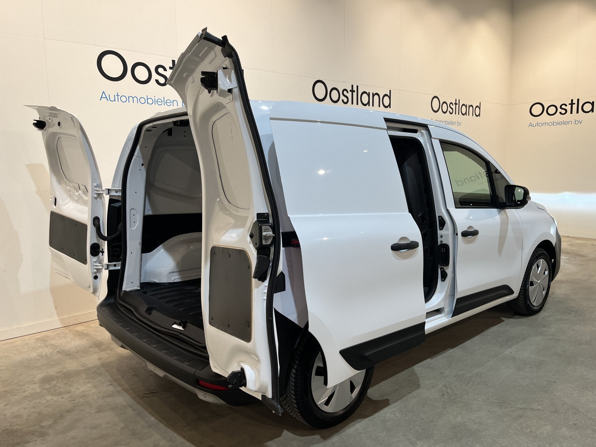 Renault Kangoo E (Nissan E-Townstar) Acenta L1 44 kWh / 100%, Auto's, Stof, Zwart, Met garantie (alle), Renault