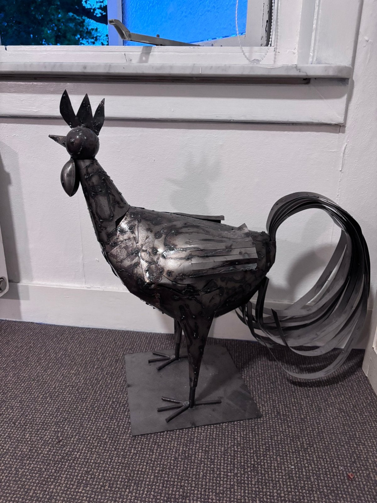 Haan rooster metaal kunst, Ophalen