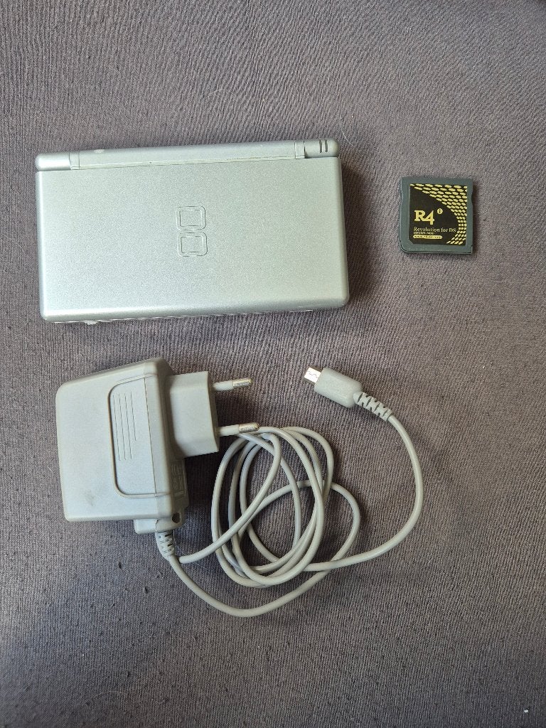 Zilveren Nintendo DS Lite – Complete Set, Met games, Ophalen of Verzenden, Zo goed als nieuw, Zilver