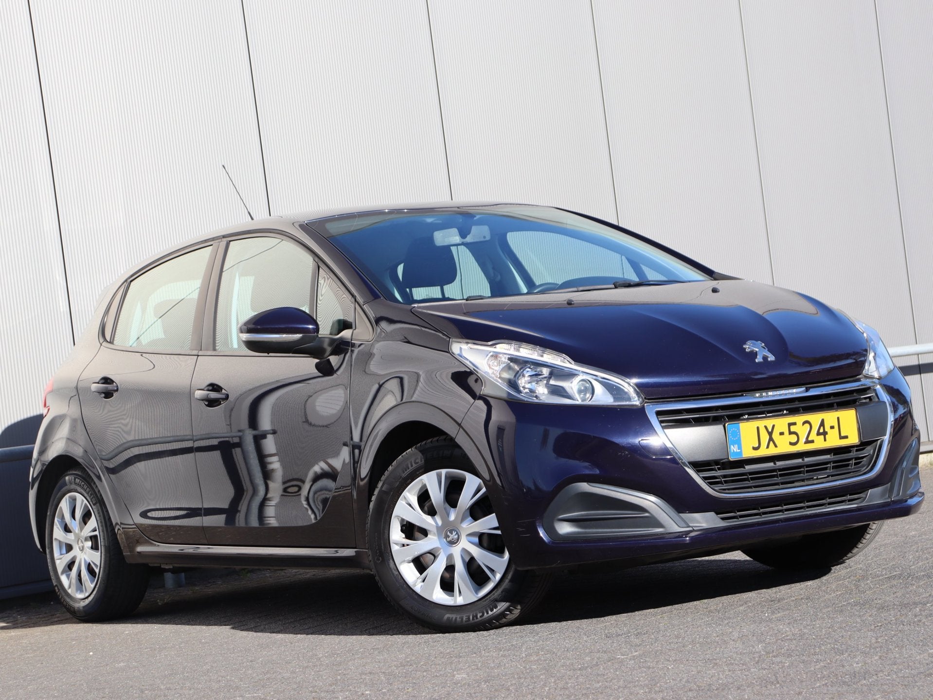 Foto 4 van Peugeot 208 1.2 PureTech Active airco navi org NL