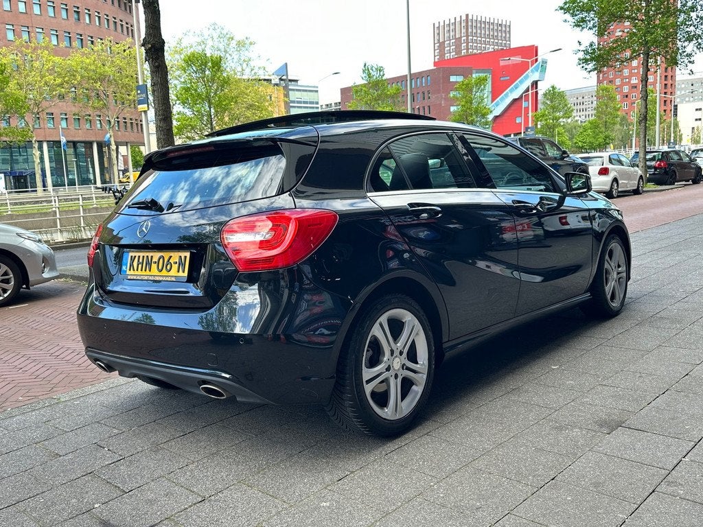 Mercedes-Benz A-klasse 200 Prestige Automaat Leer Navi Pano, Auto's, Mercedes-Benz, Gebruikt, Zwart, Bedrijf, 19 km/l