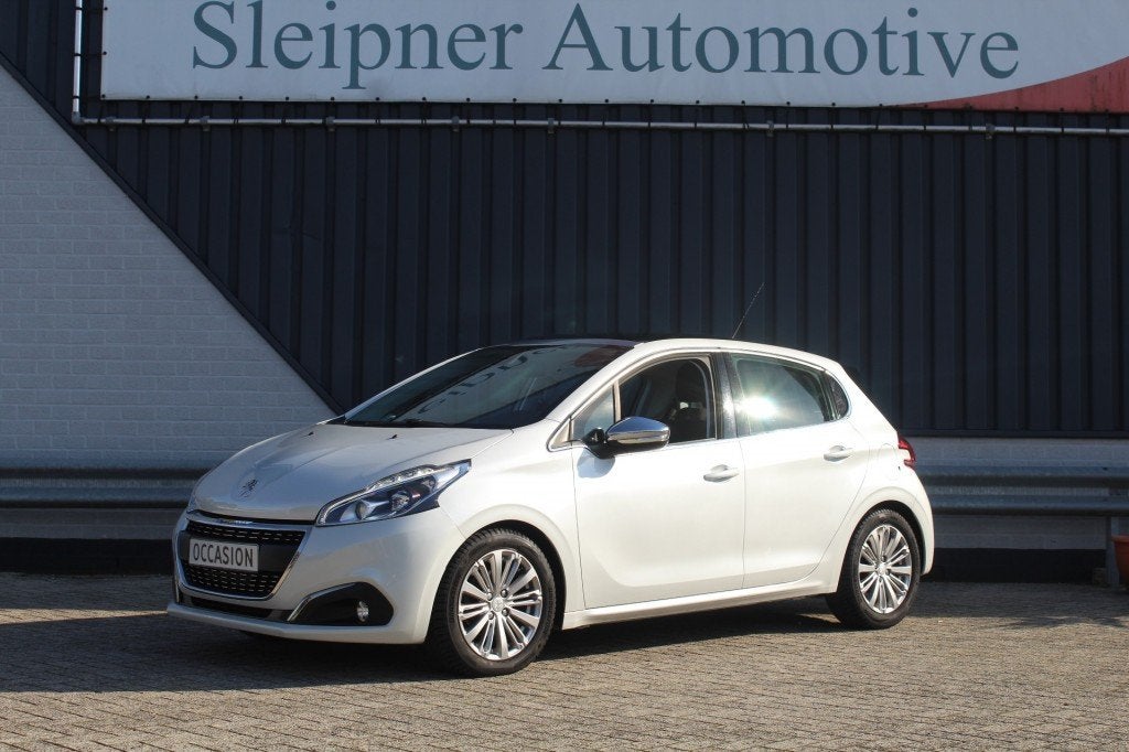 Peugeot 208 1.2 PURETECH ALLURE/ AUTOMAAT- NAVI-PANO-D.riem, Auto's, Gebruikt, Euro 6, 1199 cc, Verwarmde buitenspiegels