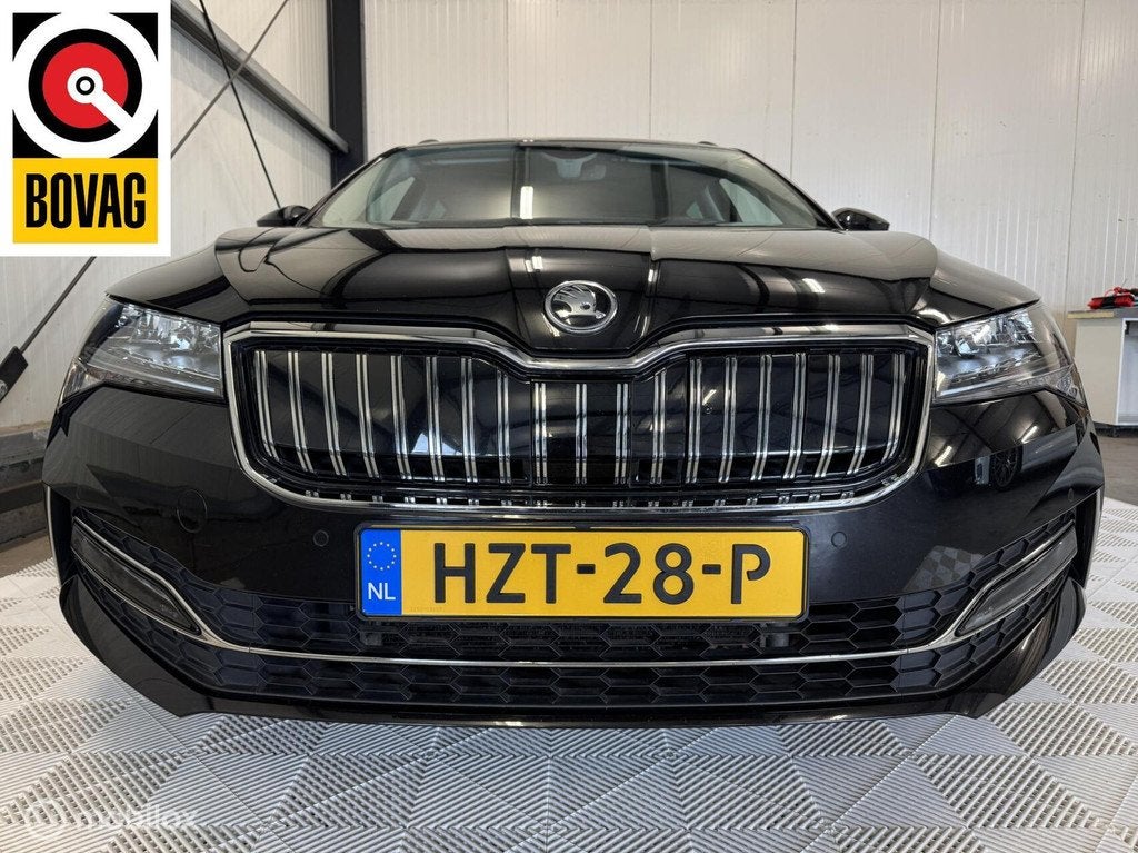 Skoda Superb Combi Hybrid Bns Ed Plus | HUD | Pano | Leer, Auto's, Skoda, Gebruikt, Zwart, Zwart, Hybride Elektrisch/Benzine