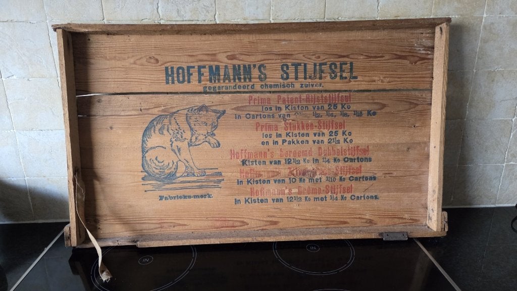 Hoffmann’s stijfselkist deksel, Ophalen