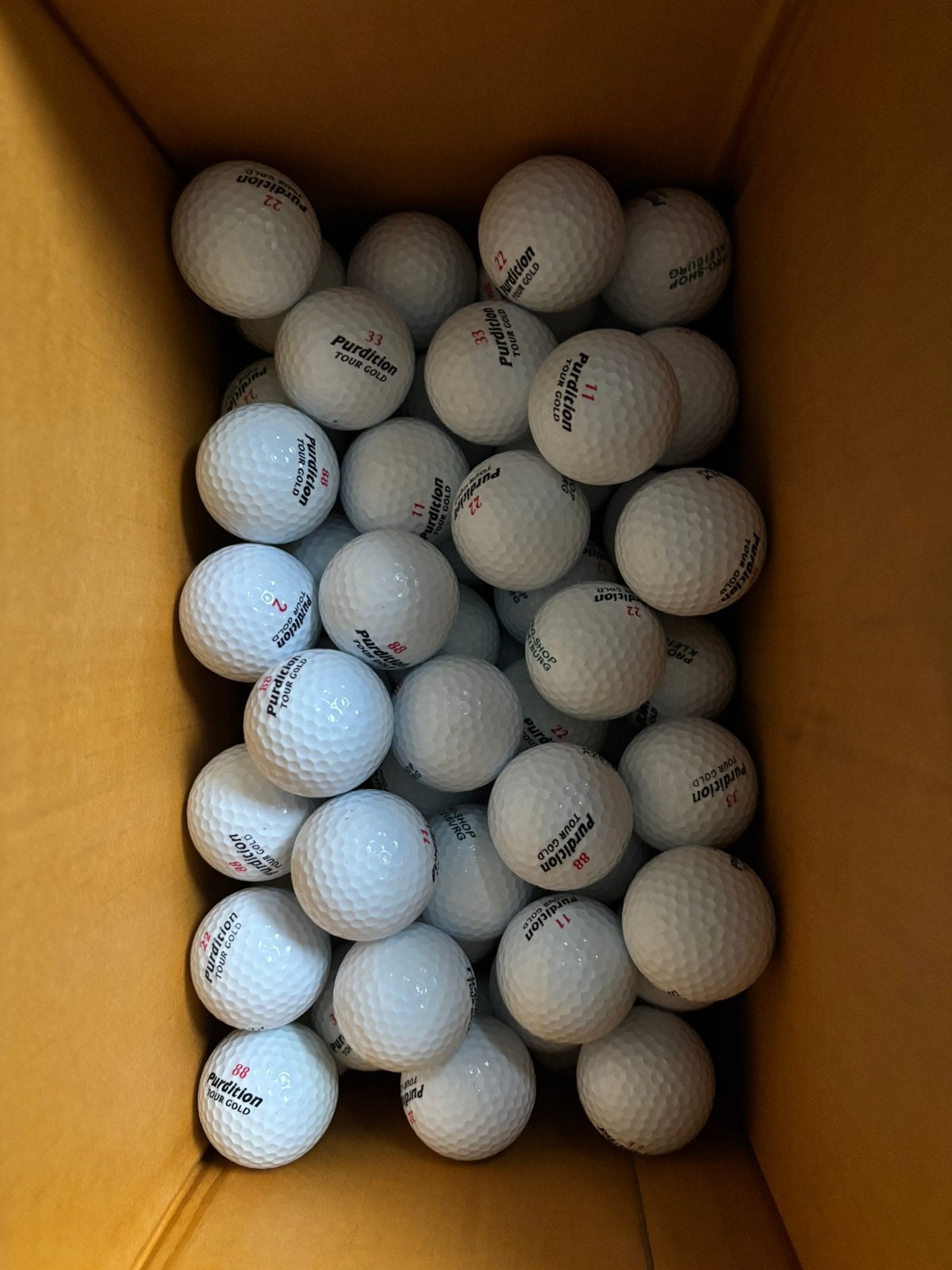 100 stuks golfballen (Purdition), Ophalen of Verzenden, Zo goed als nieuw