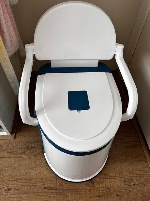 Draagbaar toilet, Ophalen