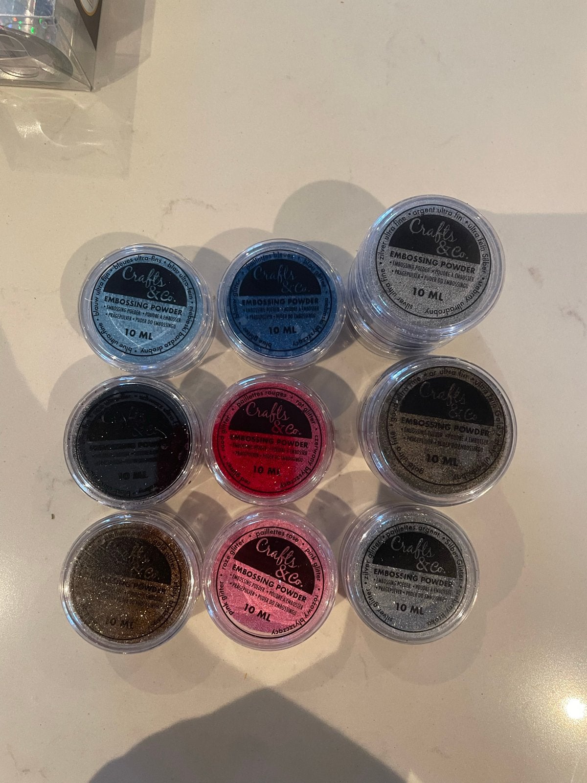 11 potjes embossing powder van Crafts & Co. - Diverse kleure, Gebruikt, Meerkleurig, Ophalen of Verzenden, Overige merken