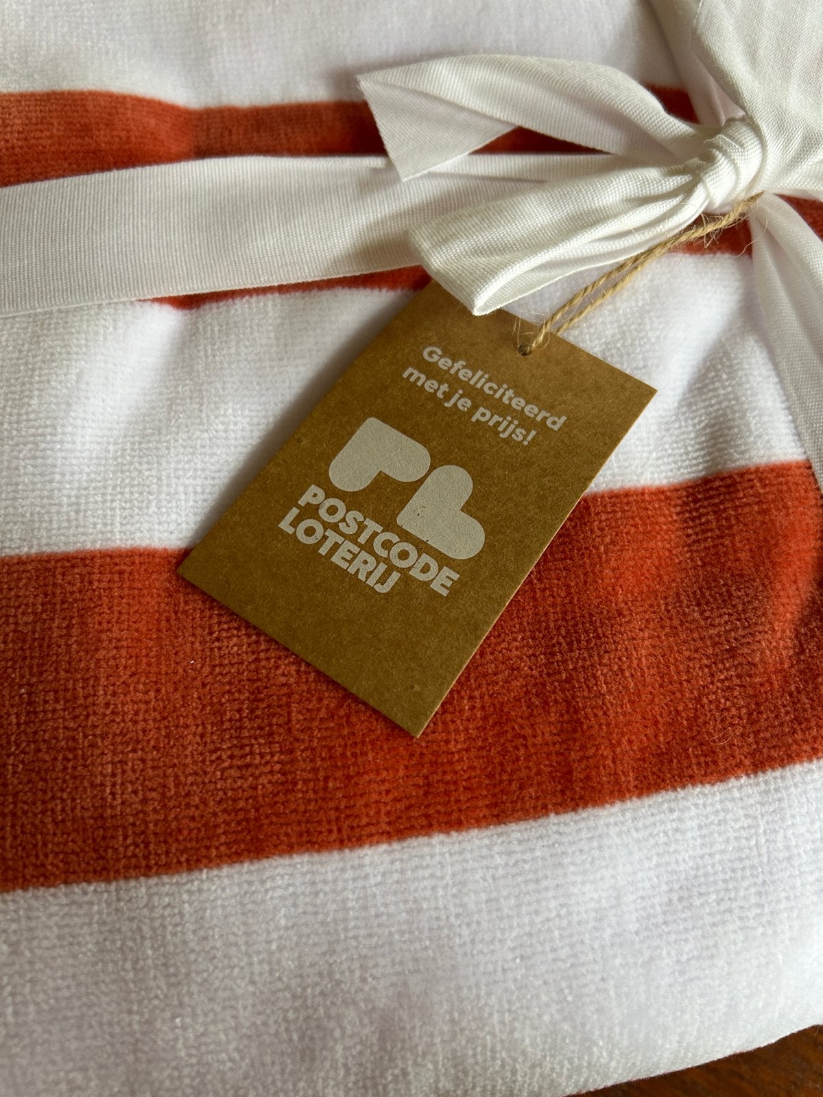 Nieuw Postcode Loterij strandlaken/badlaken, Nieuw, Ophalen of Verzenden, Textiel, Oranje