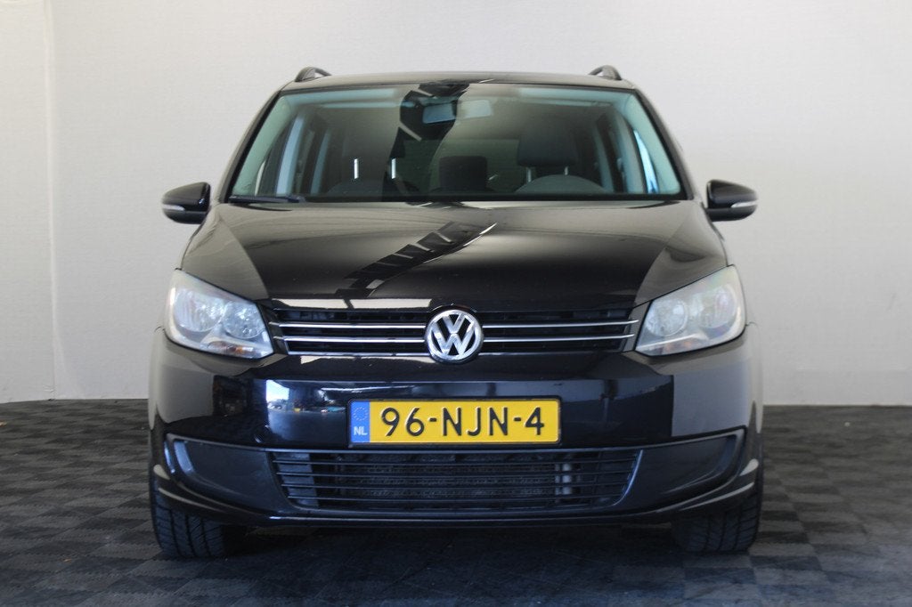 Volkswagen Touran 1.2 TSI Trendline Bluemotion 7p. |7 Persoo, Auto's, Voorwielaandrijving, Euro 5, Stof, Gebruikt