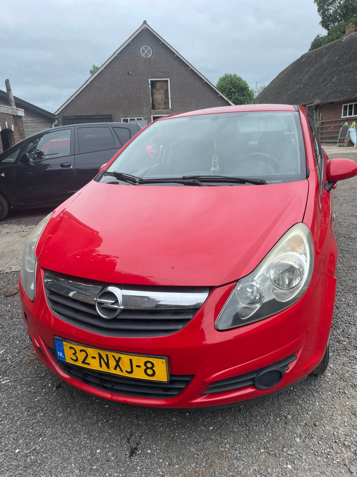 Opel Corsa 1.4 16V 5D 2010 Rood, Auto's, Opel, Voorwielaandrijving, 1063 kg, 1398 cc, 4 cilinders