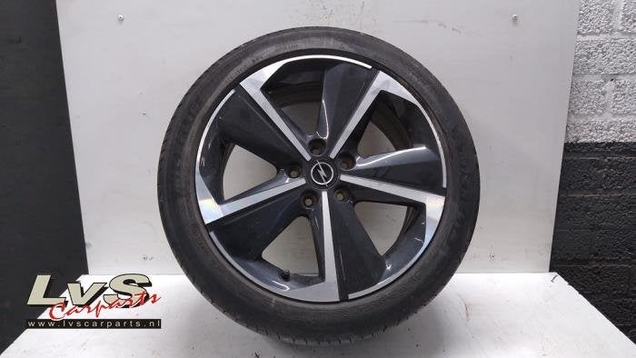 Velg + Band van een Opel Astra, Auto-onderdelen, Banden en Velgen, Gebruikt, -, -, Ophalen of Verzenden